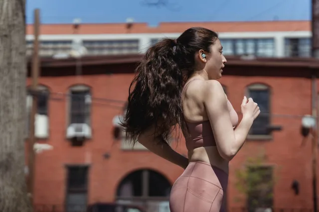 Woman running through the city